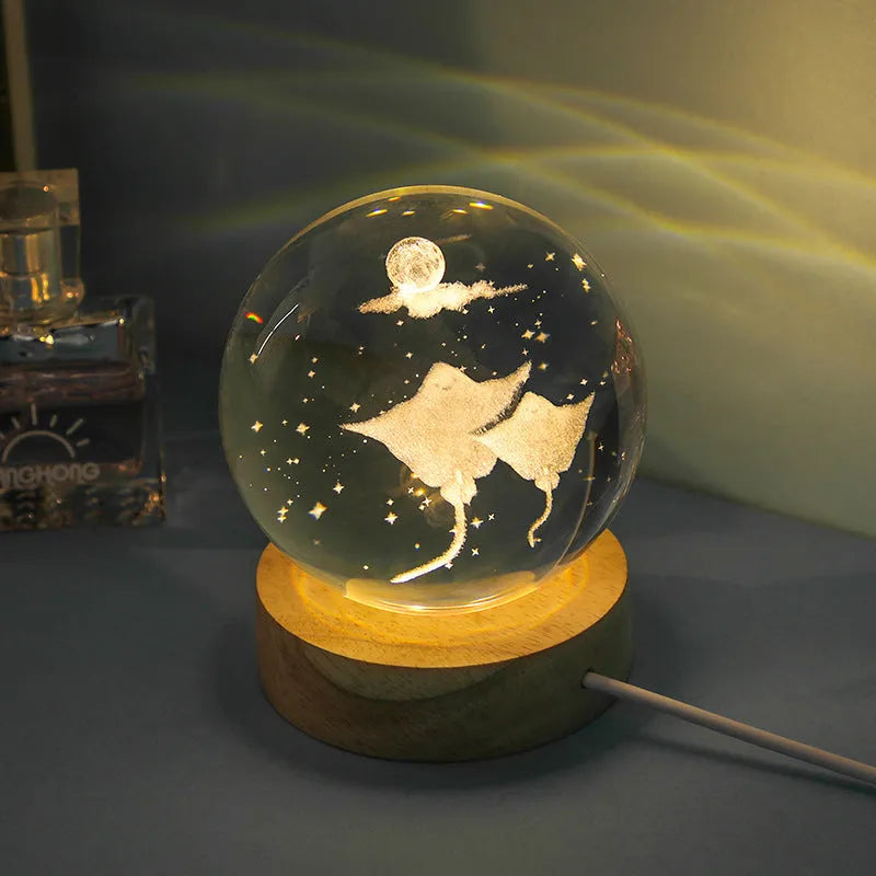Transparent crystal ball night lamp with 3D carved jellyfish design, showing 6cm size on round base.