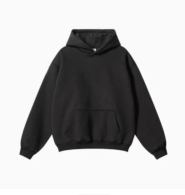 Men's grey terry cotton hooded sweater showing loose fit and drop-shoulder design