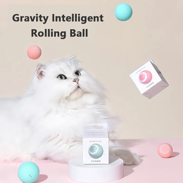 Green automatic rotating ball cat toy with intelligent obstacle avoidance, shown on a hard floor.