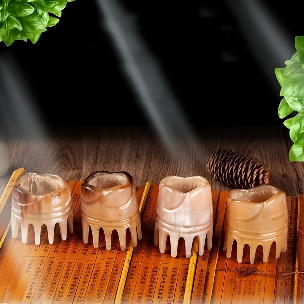 Traditional white buffalo horn comb with wide teeth and pointed tips for meridian massage