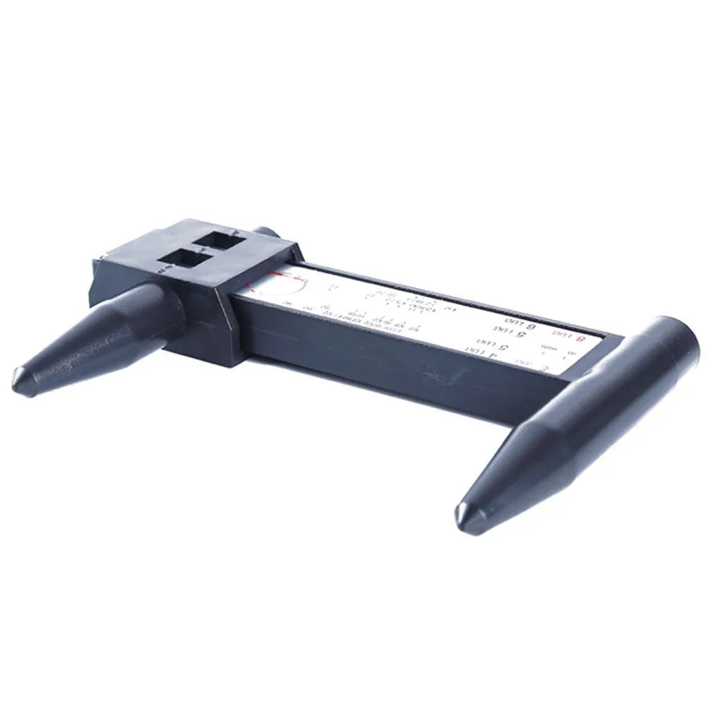 Electronic digital caliper hole distance measuring tool on a workbench