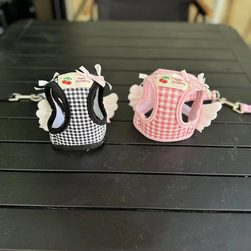 Pink and black cotton chest and back harness with hand holding rope for small dogs.