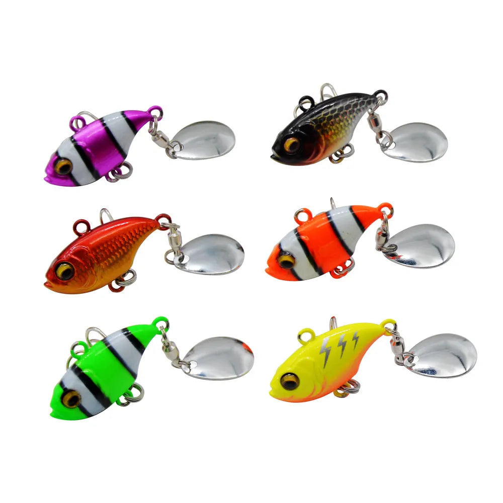Metal fishing lure with rotating sequins in zebra stripe, gold, and lightning colour patterns.