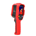 UTi series handheld infrared thermal imager on a table with USB cable and storage card.