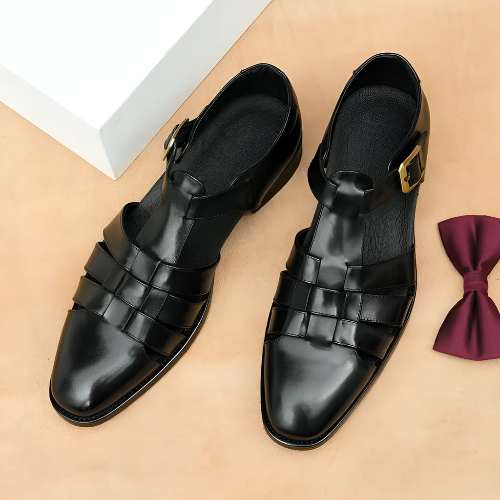 Men's black leather sandals with cowhide upper and rubber sole.