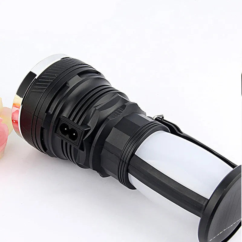 Black solar-powered emergency LED flashlight with USB charging port