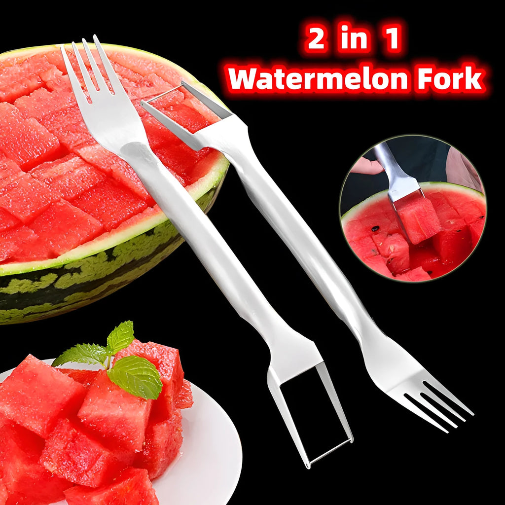 Silver stainless steel watermelon slicer and serving fork with a long handle on a kitchen surface