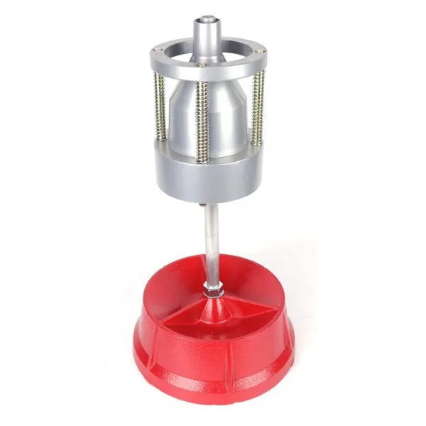 Portable aluminium hub wheel balancer with bull's eye level on an enamel base.