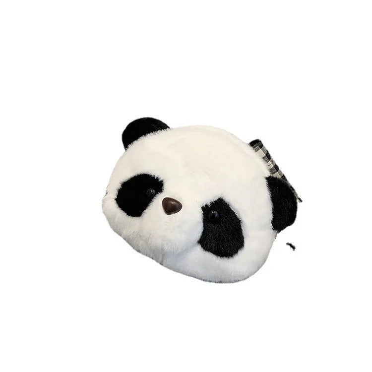 Soft plush panda head design crossbody bag showing cylindrical shape and outer pocket.