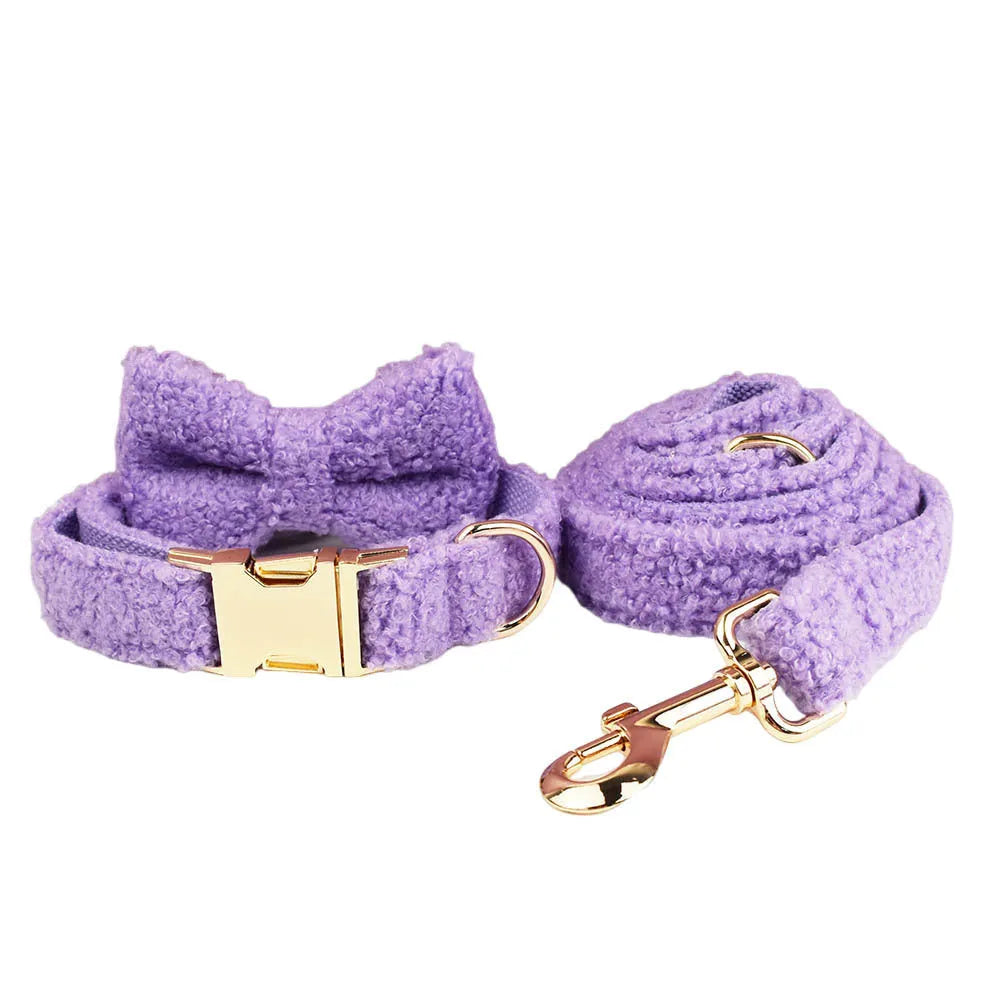 Purple cloth dog collar and leash set with matching vest and bow accessory for small breed dogs