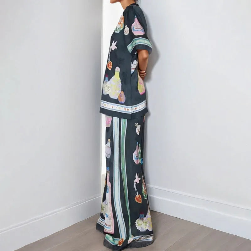Black women's cardigan and trousers set with cartoon animation pattern