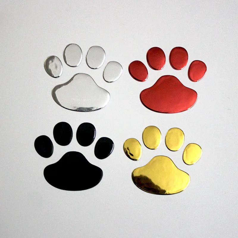 PVC car sticker pair featuring hand-shaped brush dog footprints design in choice of colours