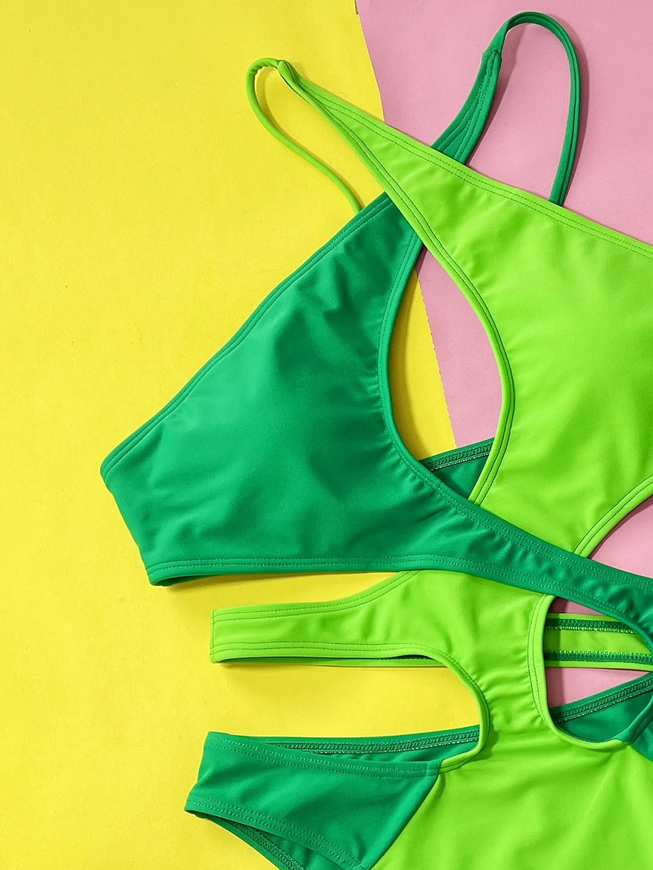 Green women's one-piece swimsuit with hollow contrast colour design in nylon fabric
