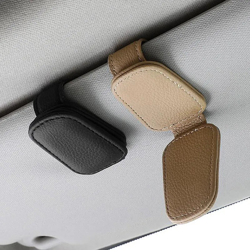 PU leather sunglasses clip holder attached to a car sun visor