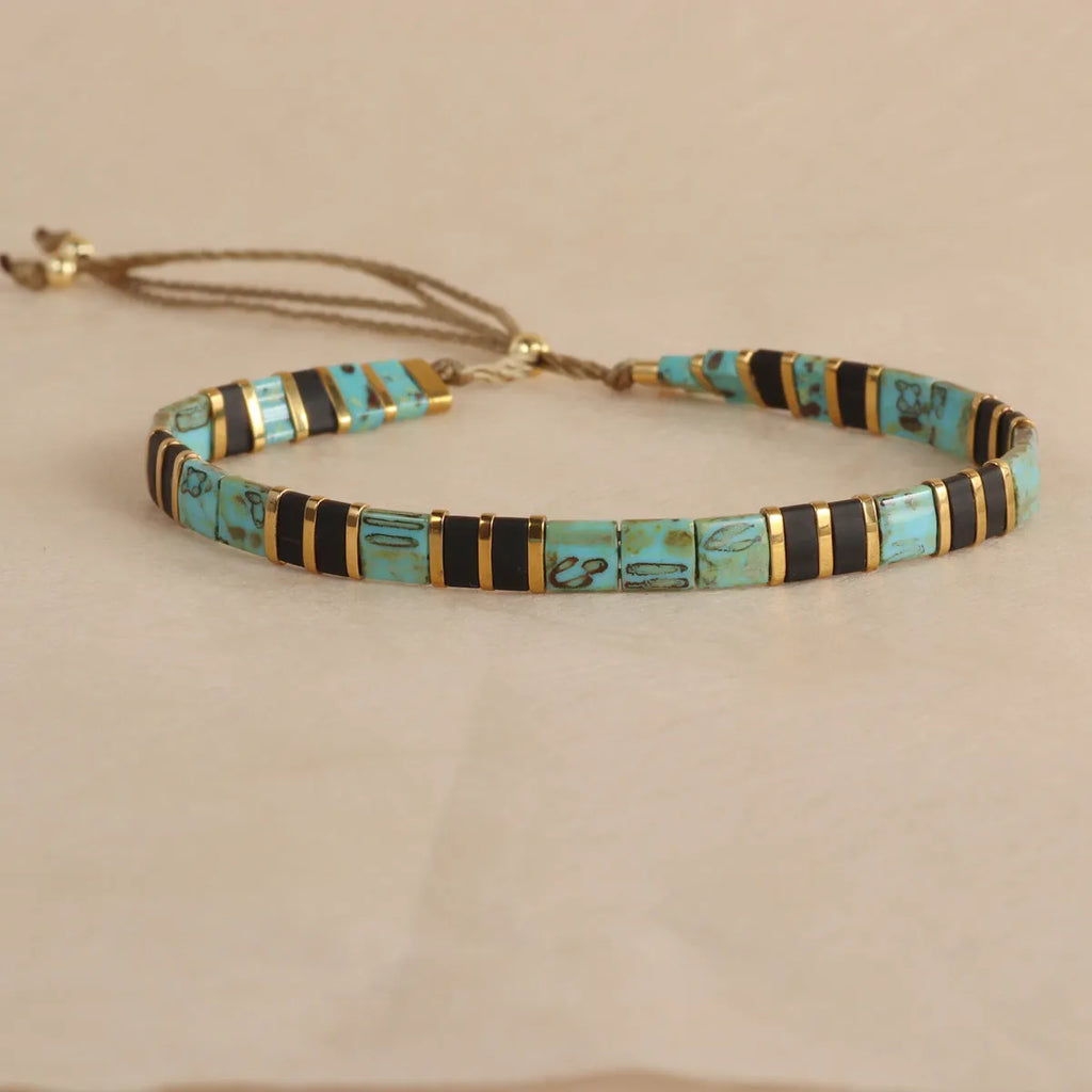 Geometric pull bead bracelet with round glass beads in five colour options