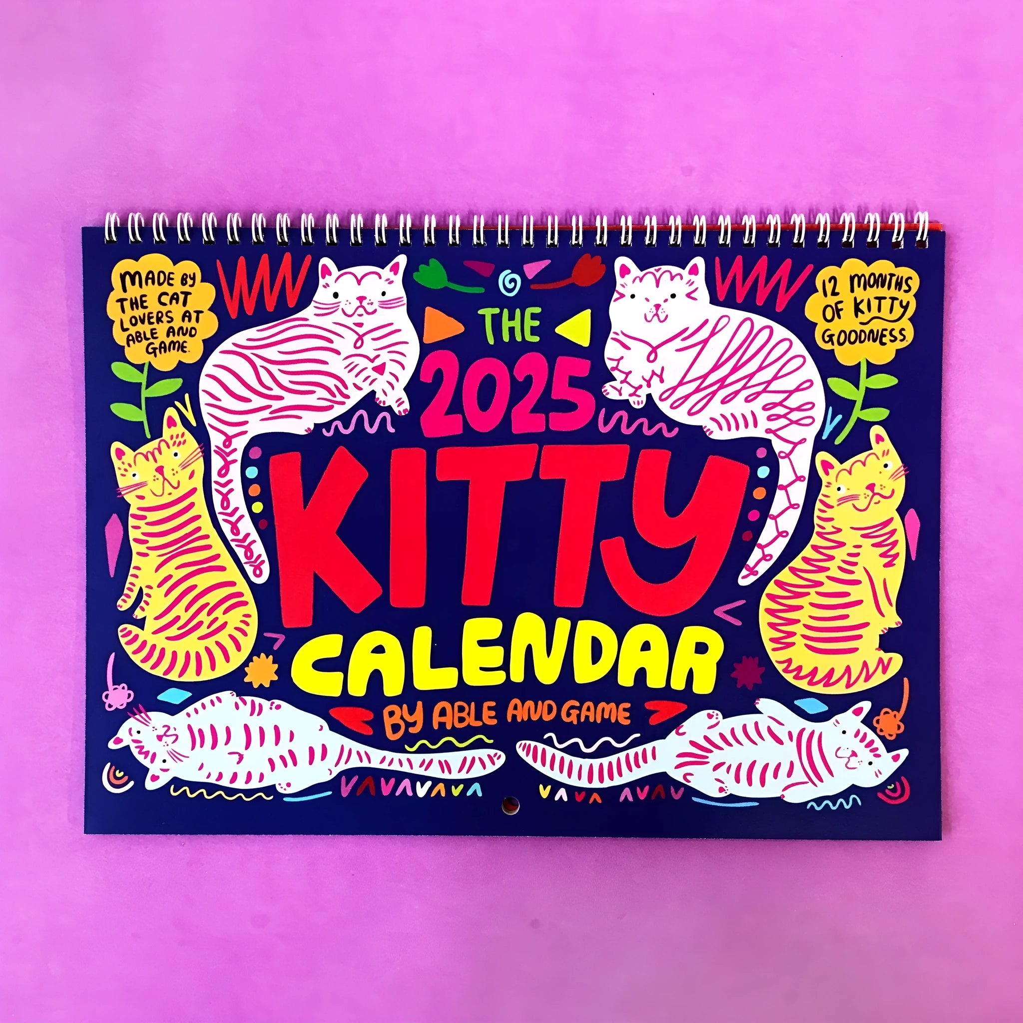 Landscape format cat wall calendar with feline photography for 2024 or 2025 planning