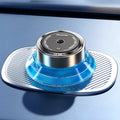 Refillable smart spray car air freshener diffuser in black or green with separate 50ml fragrance bottles.