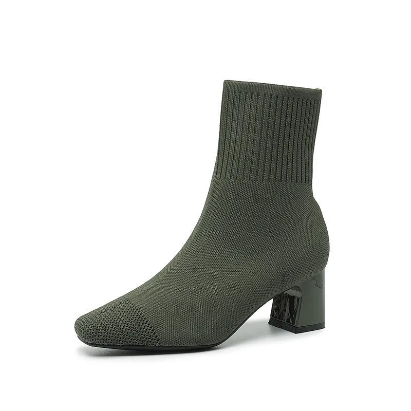 Women's knitted sock boots with chunky high heel, square toe, mid-calf length, rubber sole, available in multiple colours