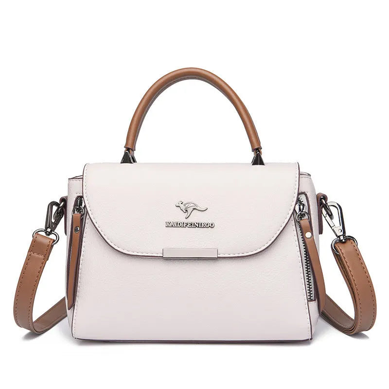 Women's genuine leather crossbody shoulder bag in horizontal square shape with slit pocket and visible stitching, six colour options
