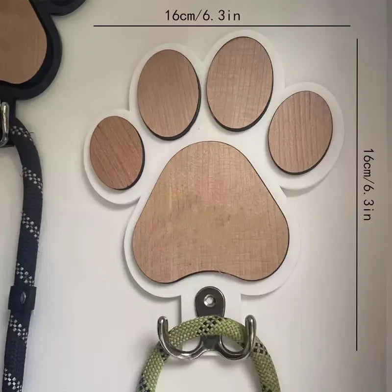 Wooden wall hook with paw print design in black or white for household organisation