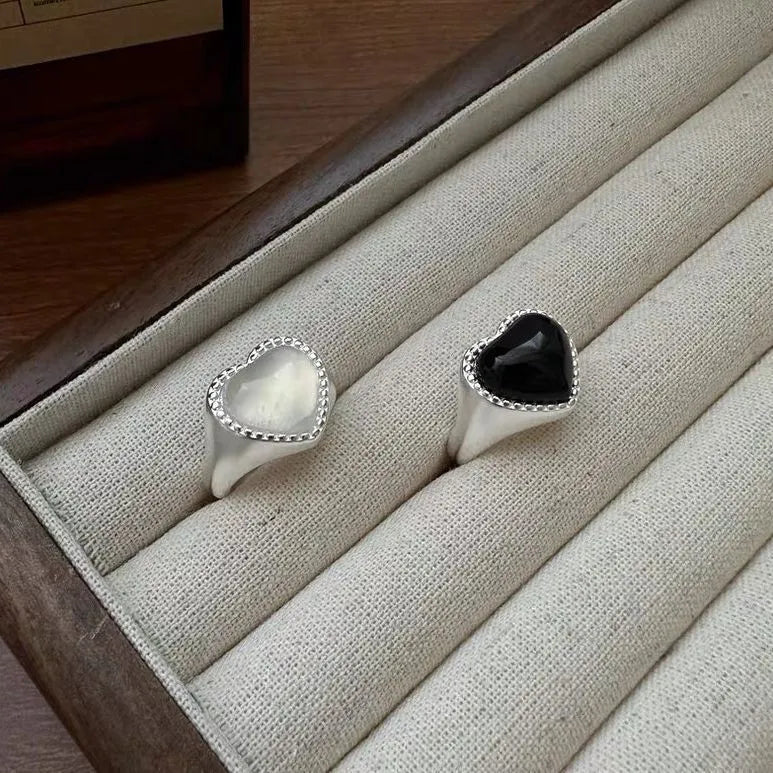 Adjustable sterling silver ring with heart-shaped black agate in open-mouth design