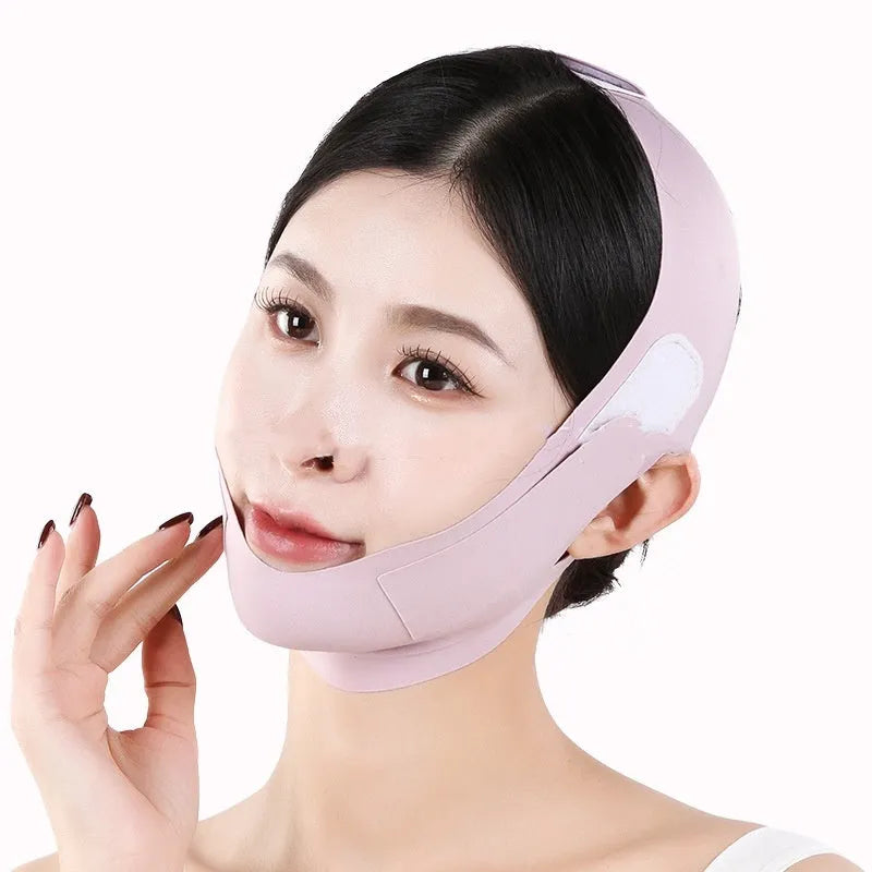 Small V face shaping mask in light breathable fabric, purple and green graphene colours.