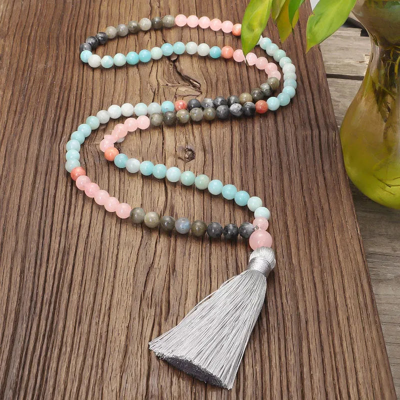 Bohemian jewellery set with colourful stone beads and tassel pendants showing necklace and bracelet pieces