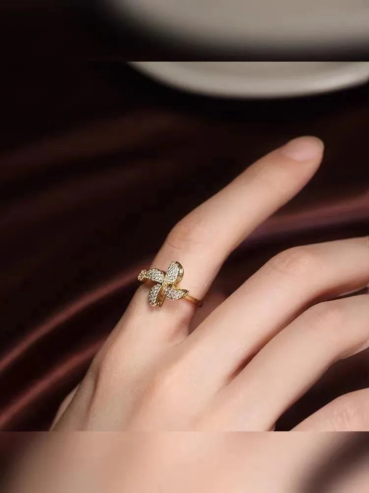 Rotating geometric windmill ring in copper with gold or silver electroplated finish
