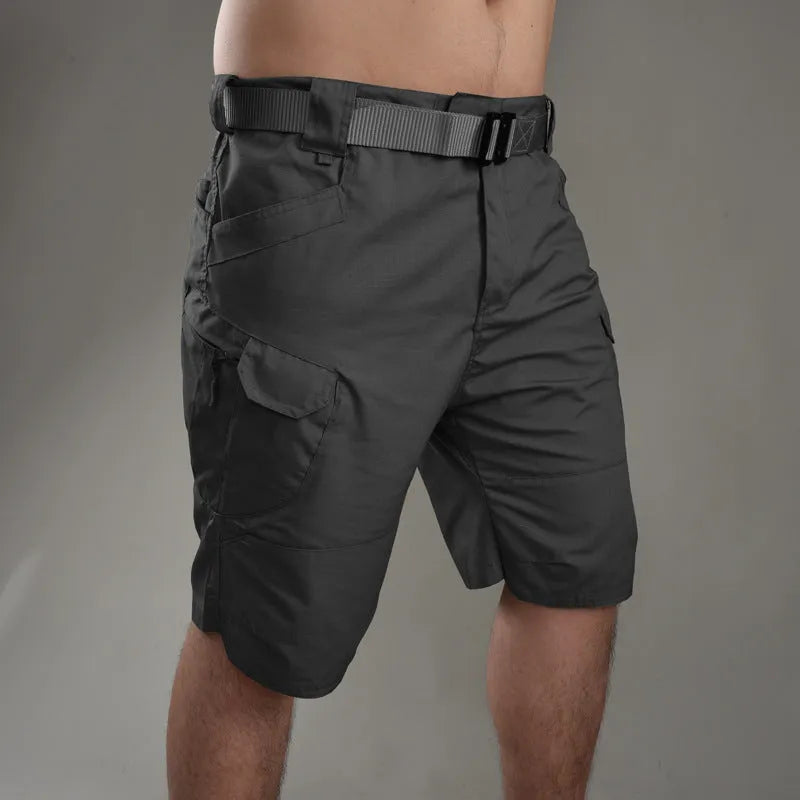 Khaki coloured tactical shorts made from cotton blend fabric on a mannequin.