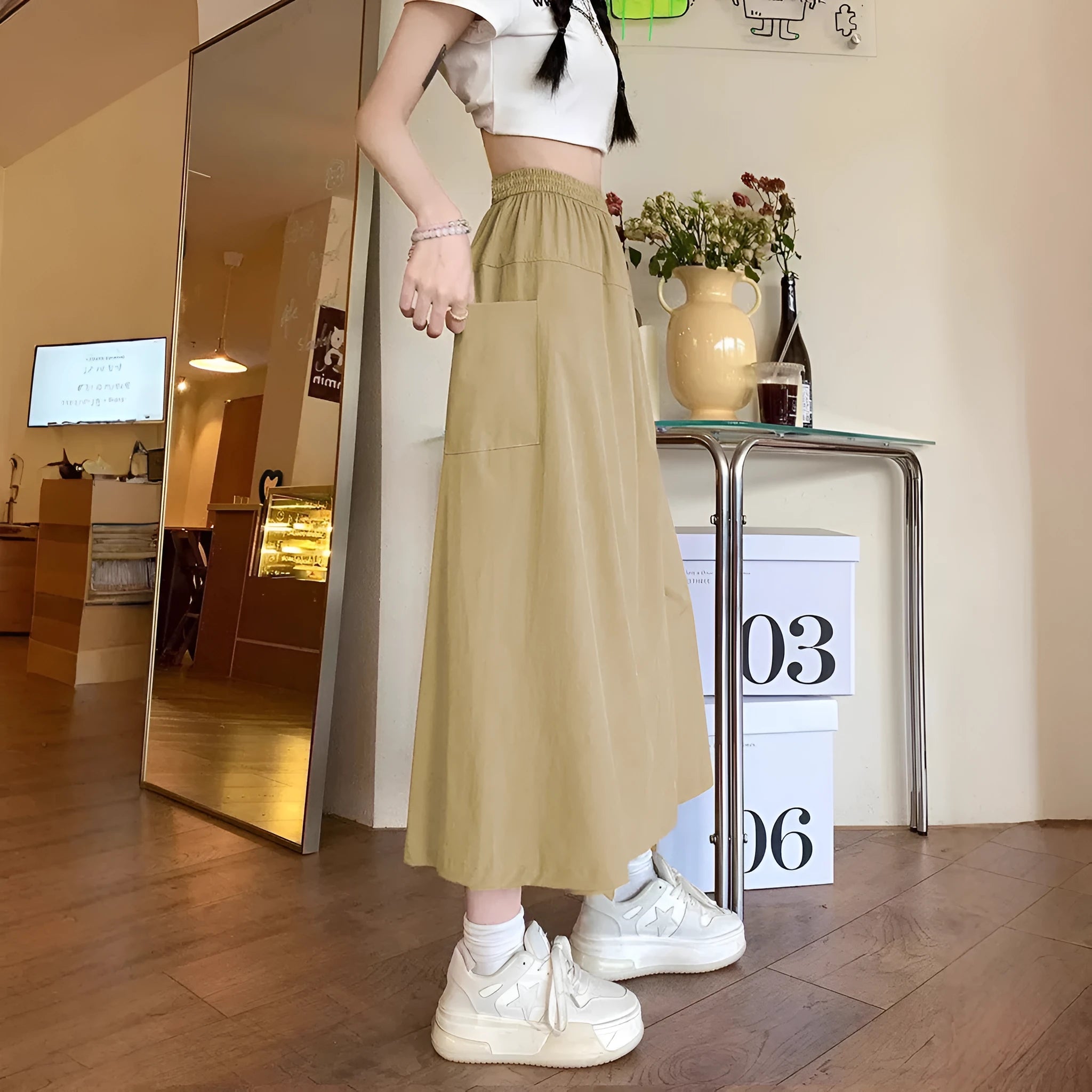 Camel coloured women's wide leg skirt with elastic waist and drape styling