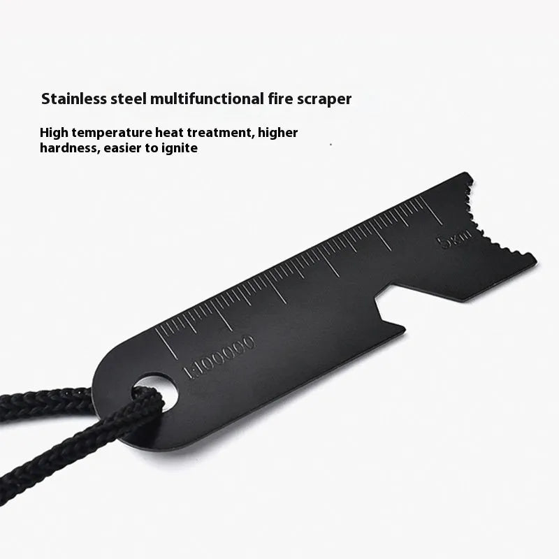 Black outdoor multifunctional flint with magnesium rod, stainless steel scraper, and survival whistle.