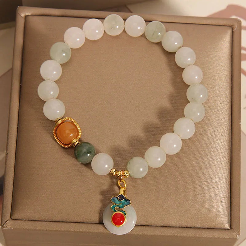 Women's ice jade bracelet with xiangyun peace buckle and pearl decorative elements