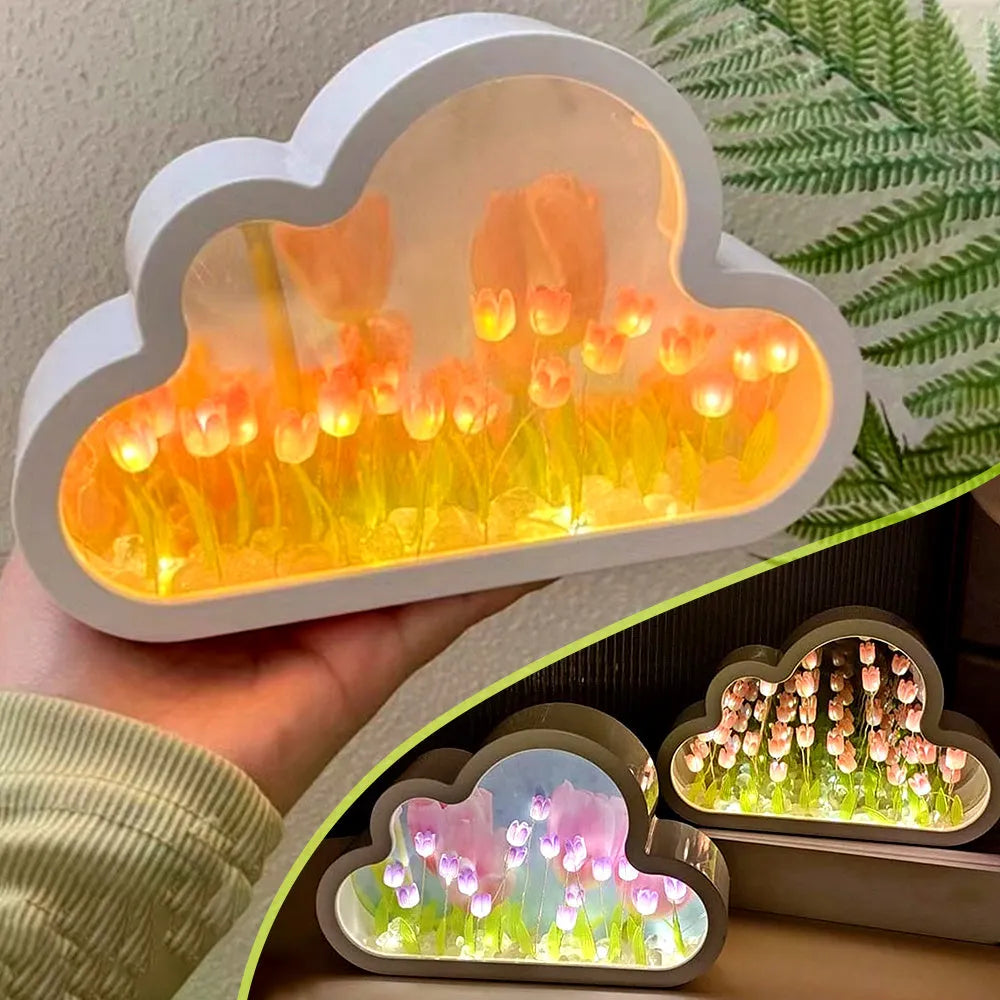Assembled pink tulip-shaped night lamp with LED light, mirror front, and small photo frame on a desk.