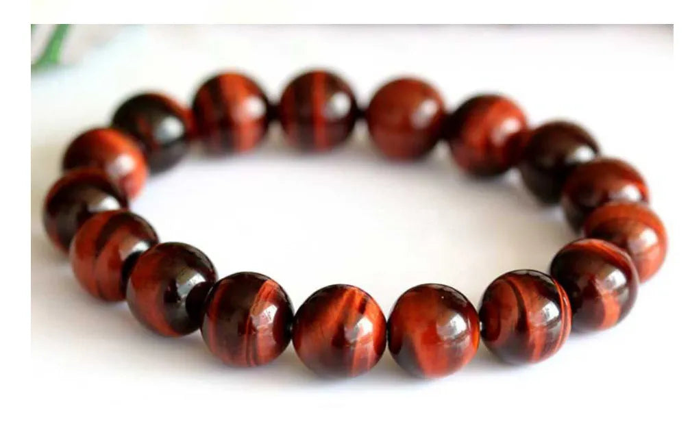 Wood alexandrite tigereye stone hand bracelet with geometric round beads in lightning cat's eye colour.