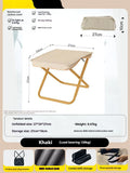 A foldable camp stool made from oxford cloth, shown in a khaki colour, folded into its compact pencil box shape.
