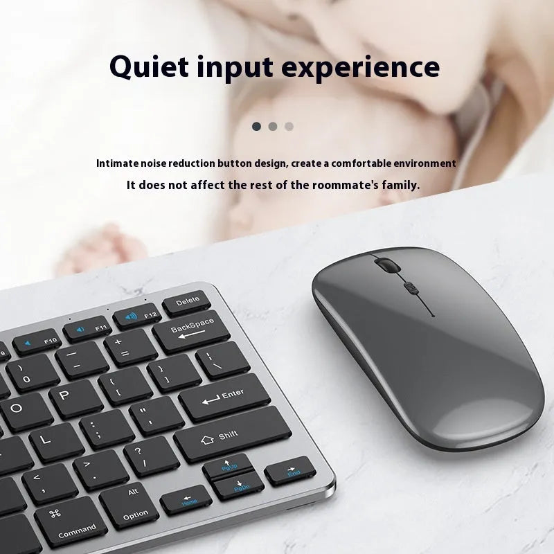 Black ultra-thin rechargeable wireless keyboard and photoelectric mouse combo set with USB receiver on a desk.