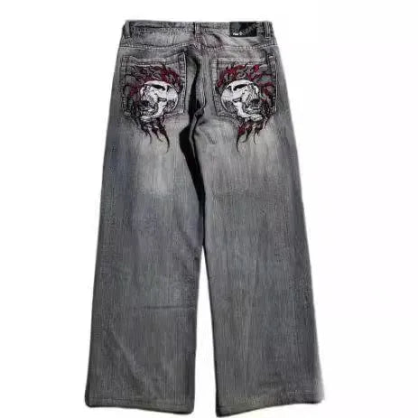 Men's grey washed-out wide-leg straight-cut denim jeans on a neutral background.
