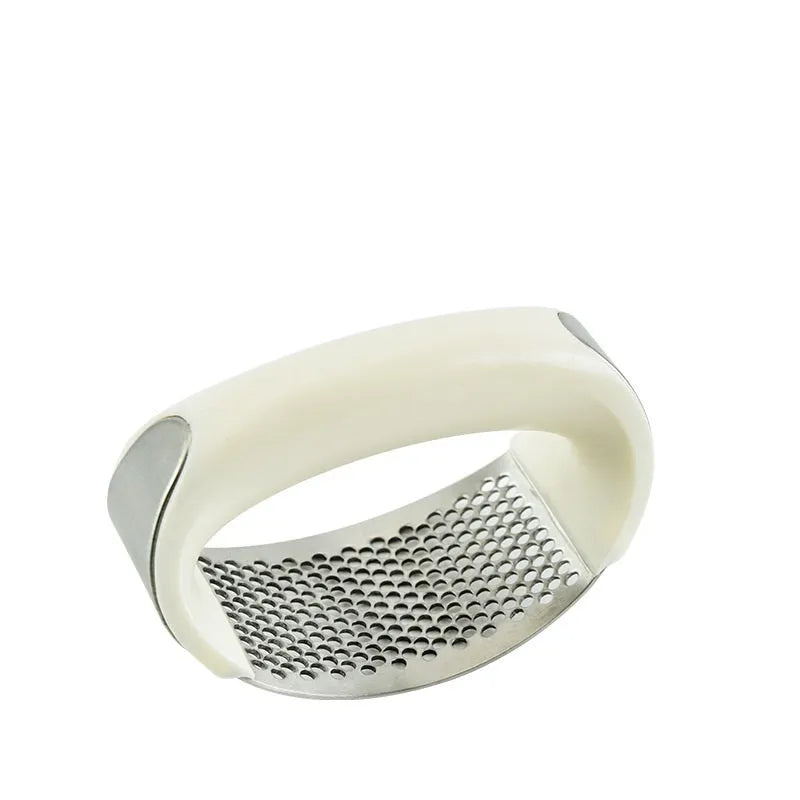 Stainless steel manual garlic press with ergonomic non-slip handle in assorted colours
