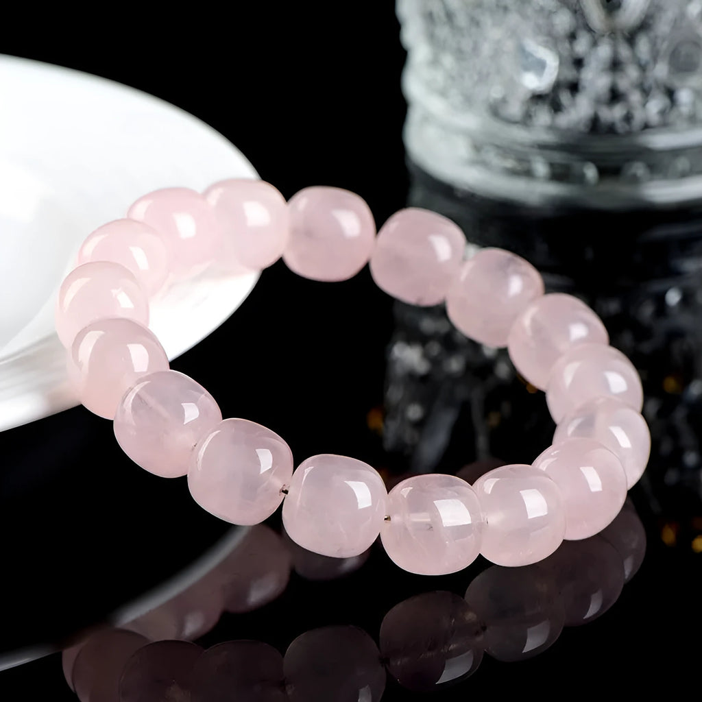 Pink crystal barrel bead bracelet with geometric design, 11-12mm beads, unisex accessory