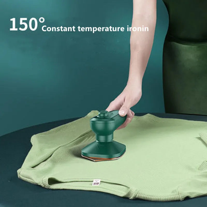 Dark green portable hanging ironing machine with ceramic panel and handheld design.