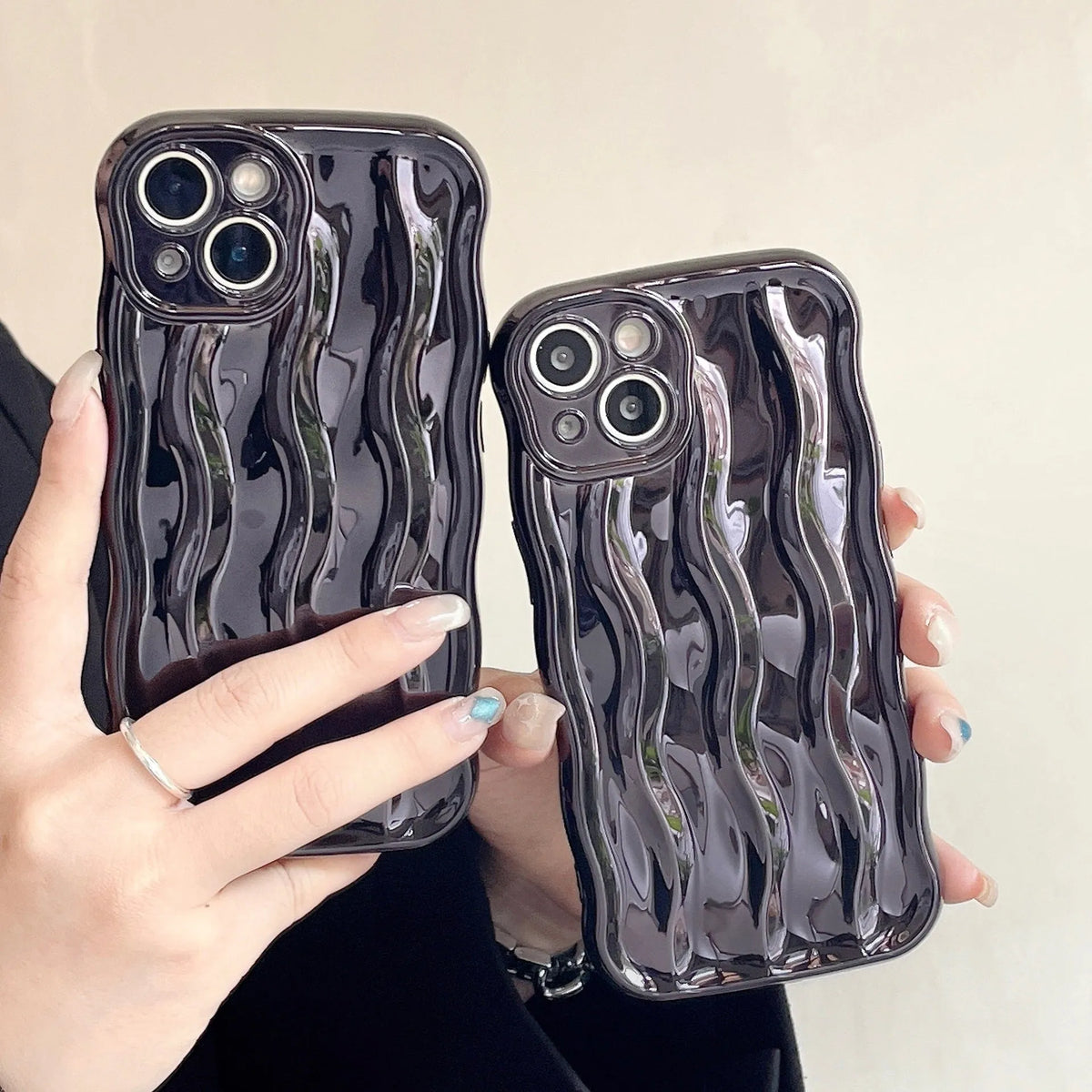 Electroplated water ripple iPhone case in silver with anti-fall TPU construction for iPhone 11-14 models.