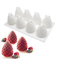 Set of six silicone baking moulds shaped like pineapples and pine cones
