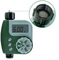 Green programmable digital garden hose timer with dual outlets and large LCD display connected to a faucet.