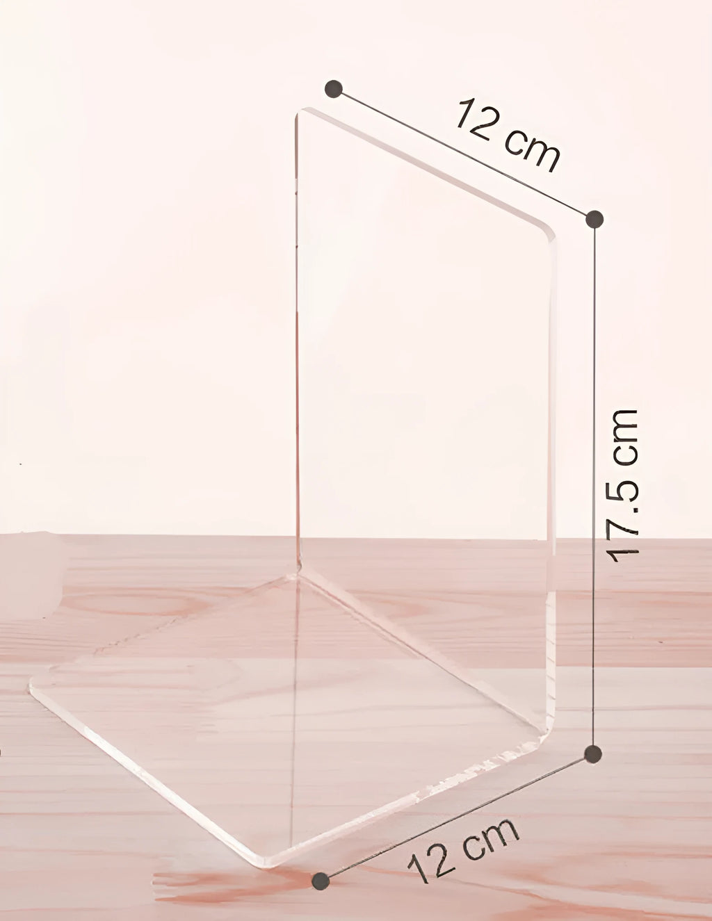 Transparent acrylic bookshelf displaying organised books on a study desk