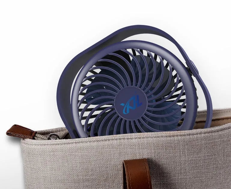 USB-powered alarm clock fan in blue with 360-degree rotating head on a desk.