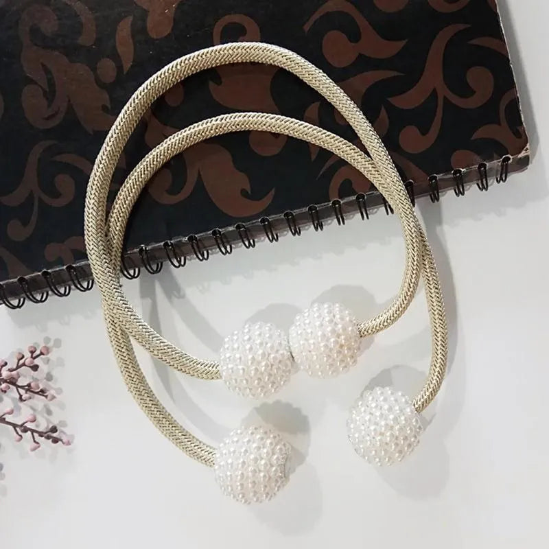 Magnetic curtain tiebacks with pearl beads in multiple colour options on white background