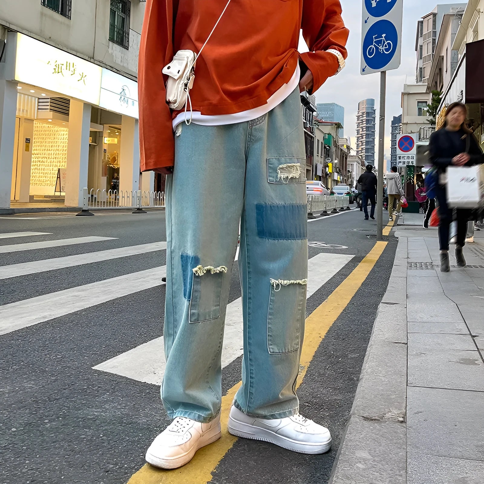 Men's loose straight leg ripped jeans in blue denim, high street style, micro-elastic fabric