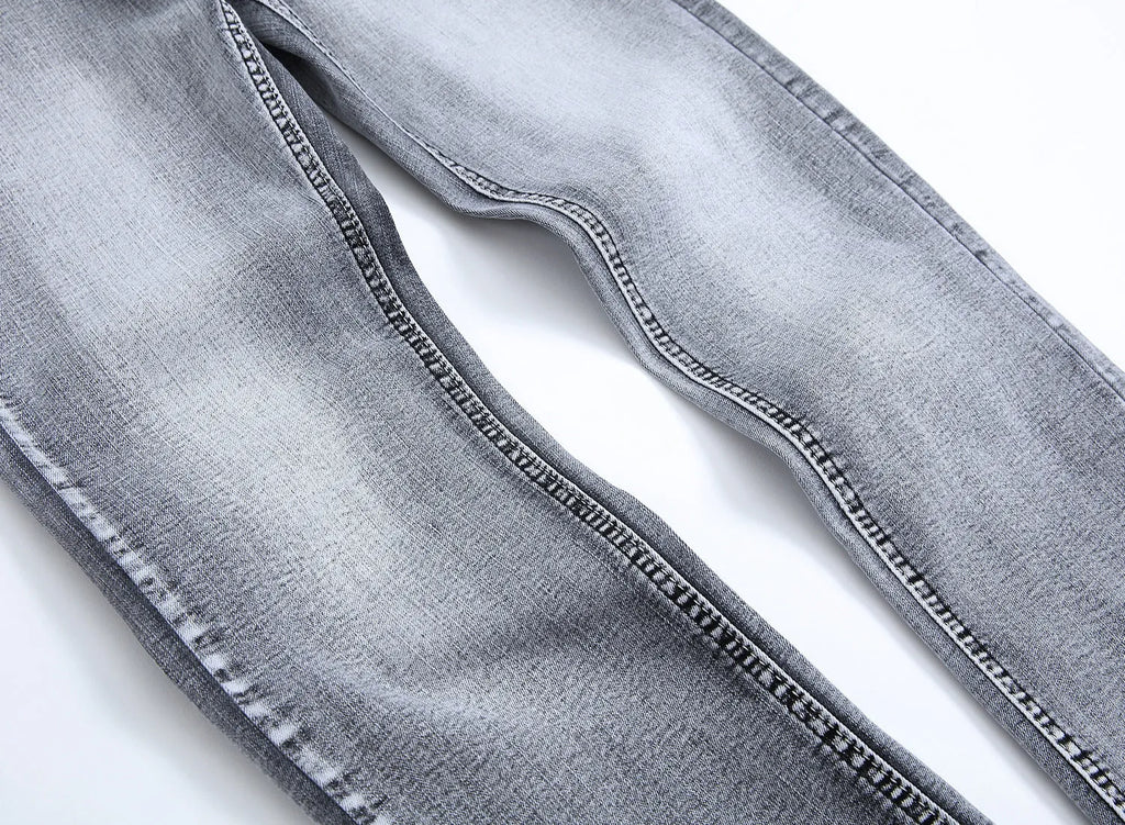 Men's grey slim fit straight leg jeans with mid waist and washed whiskers denim finish