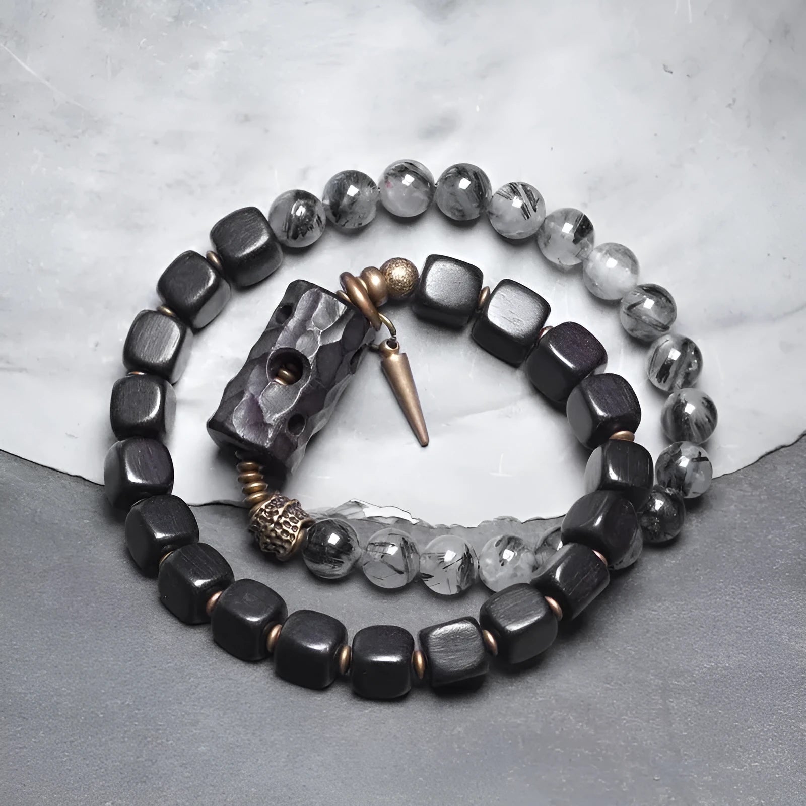 Ethnic style black hair crystal mixed handmade texture bracelet on a neutral background