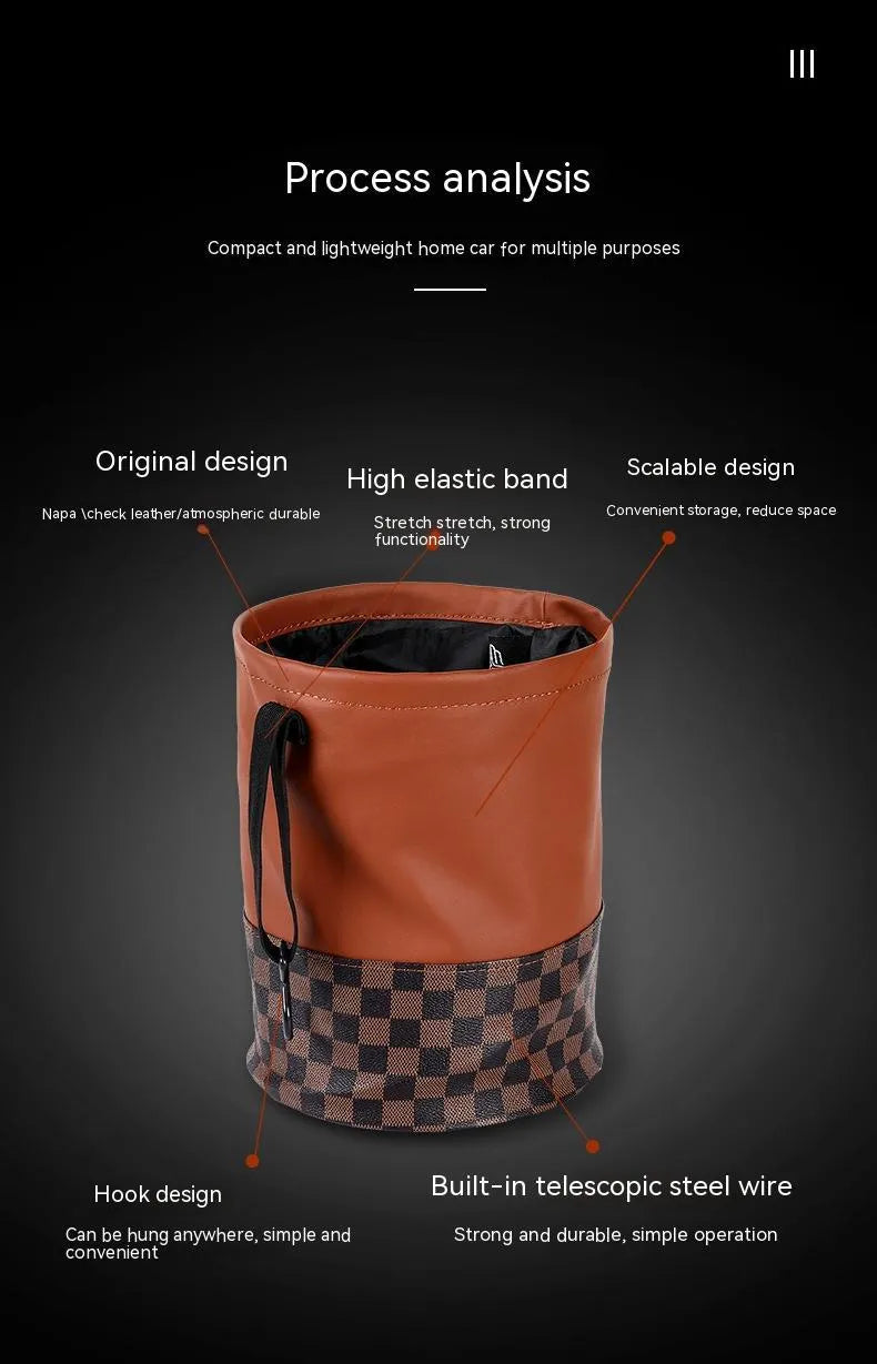 Leather retractable car trash can shown in folding design with carry handle